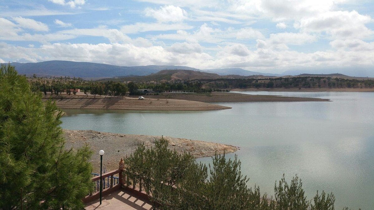 Experience tranquility at the shores of Lake Lalla Takerkoust, a picturesque retreat near Marrakech