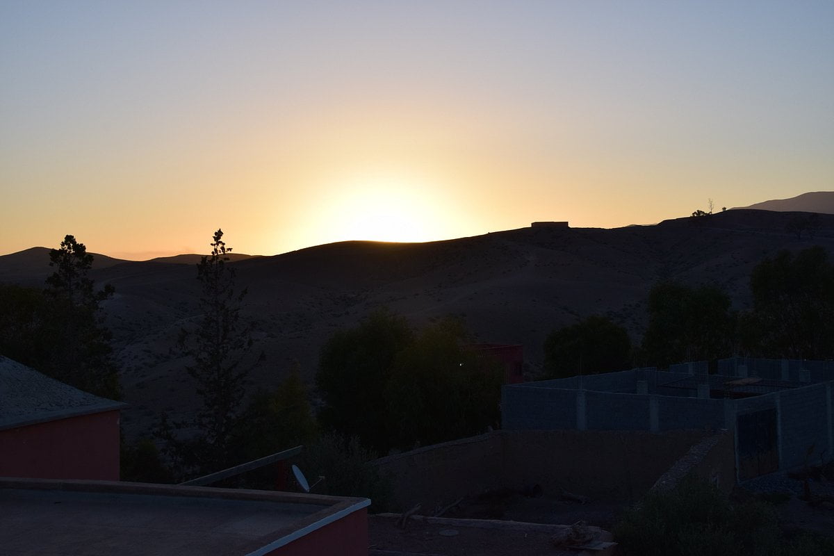 Witness a stunning sunset at Lake Lalla Takerkoust, offering breathtaking views and peaceful surroundings